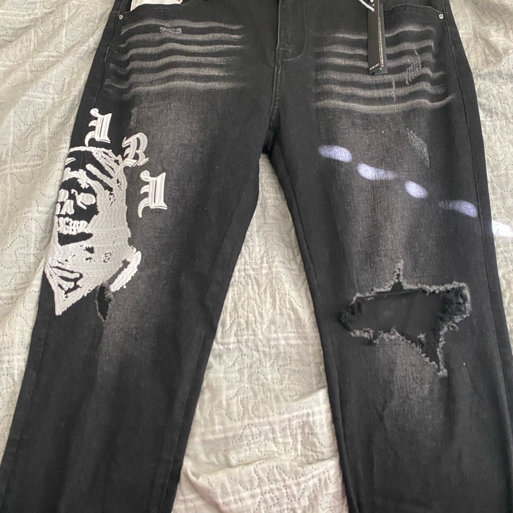 AMIRI Black Distressed Skinny Jeans
